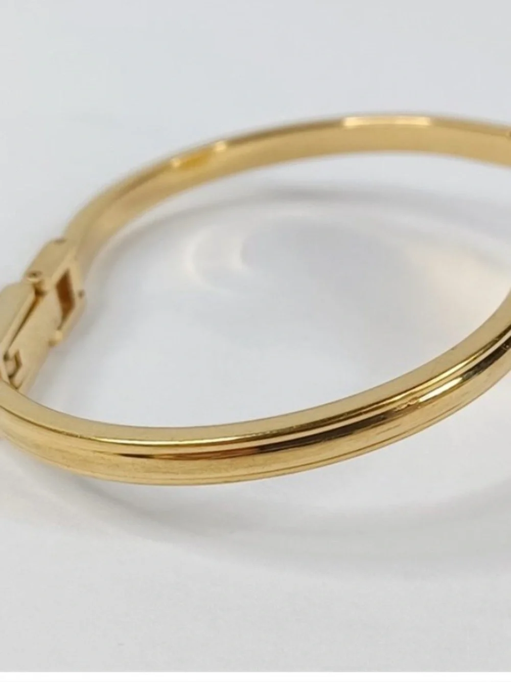 Gucci Gold Bangle Watch with Green and Red Bezel